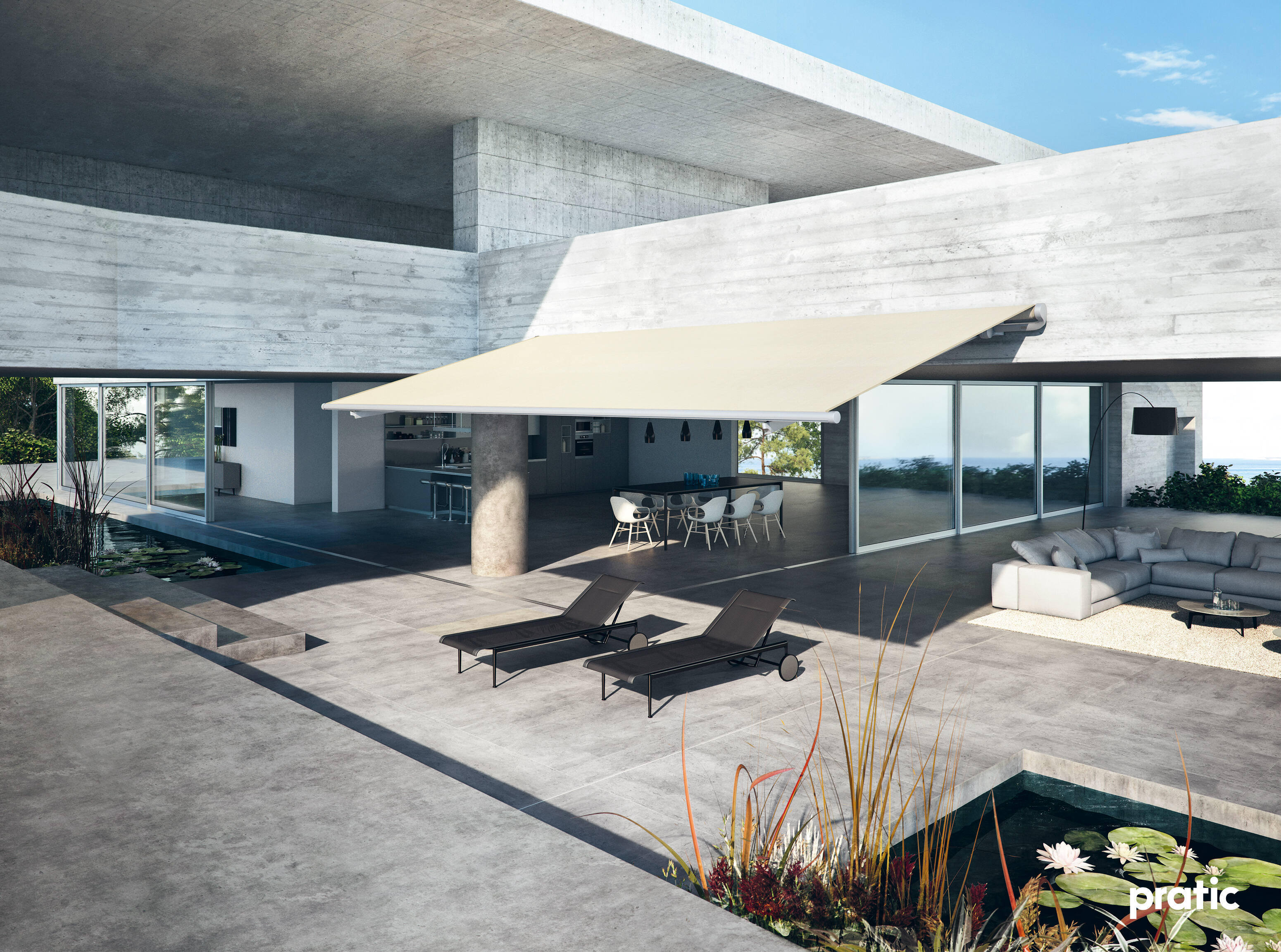 Retractable awning in white attached to a home covering black furniture Retractable awning in white attached to a home covering black furniture