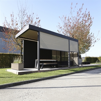 Linarte aluminum cladding wall incorporated as side enclosure of an aluminum pergola on patio